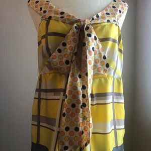 Anthropologie silk top with front tie bow.